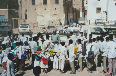 Surrounded by school children wanting to look at the motorcycle