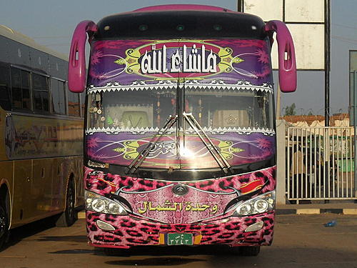 The leaning shithouse of Gallabatt-multicoloured-sudanese-bus.jpg