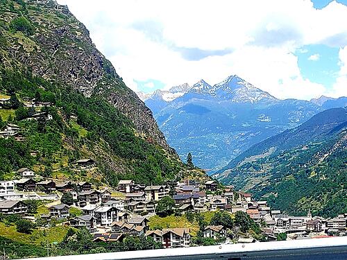 The Ride - Texas headed north and east, way east-mountain-village-with-snowy-mountains.jpg