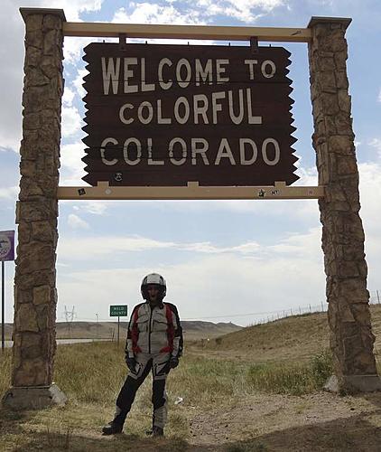 Finding Freedom...World Wide Ride-sara-at-colorado-sign.jpg