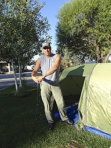 Finding Freedom...World Wide Ride-dan-wringing-out-the-tent.jpg