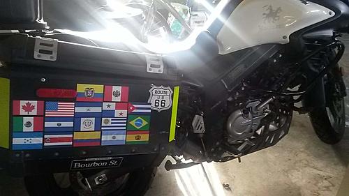 Country flags bumper stickers on panniers-moto-stickers.jpg