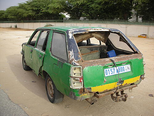 Which older car brands/models are the most ubiquitous in Africa?-modern-taxi-with-aircon.jpg