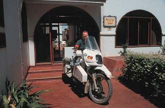 Grant and bike leaving hotel in Sullana, Peru.