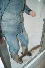 Grant washing up in the tub after the Dalton Highway, Alaska.