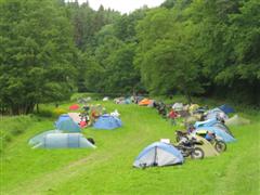 large roomy campground under the trees