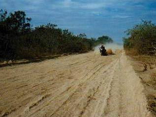 Jane on a sandy road in Bolivia