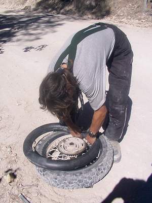 Falk changing the tire.