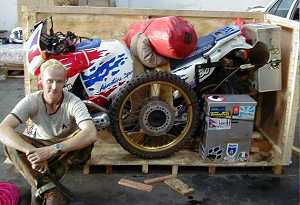 Liam McCabe with his crated Africa Twin - Note: you must be connected to the Web to see this image