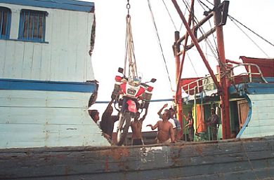 Cargo ship from Malaysia to Indonesia.