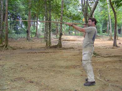 Rich tries out a blowpipe.