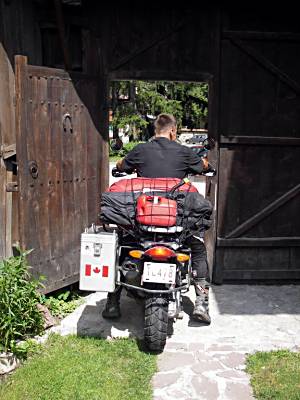 Leaving our Hotel through the wooden gate. Maneuvering the beemers through tight space is not easy.