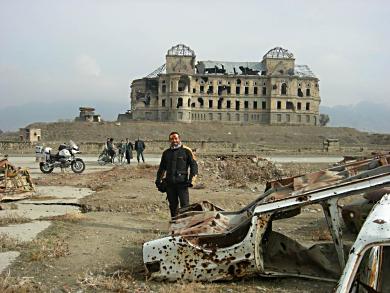 Ruined cars and building.