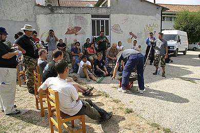 Grant demonstrating the finer points of tire changing at the HU Portugal meeting.