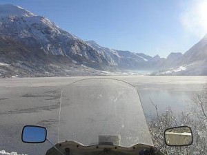 by Andy Gower, UK; Overlooking a Norwegian fjord, whilst on a Scandinavian tour Jan 2007, 85cc Honda cub.