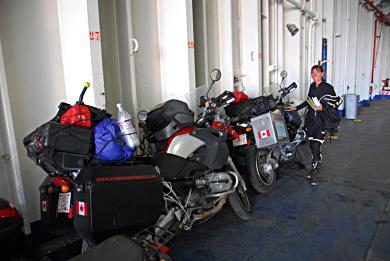 The motorcycles are loaded in the hull of the ship. We on the Ustica Lines Ship.