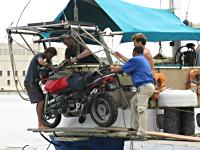 Loading the bike for transport to Colombia.