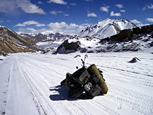 by Sean Howman, Australia; A minor spill on a slippery Pamir highway in the wrong season, India to the UK via Central Asia; BMW R65.