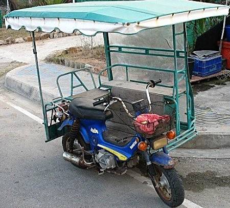 Honda Chaly with bench seats attached