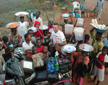 by Gil Briones, Brazil, of Raphael Karan, on the road in Ghana, on 5 Continents Project, Honda Transalp.