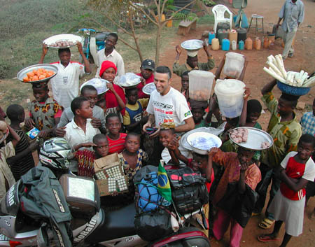 by Gil Briones, Brazil, of Raphael Karan, on the road in Ghana, on 5 Continents Project, Honda Transalp.