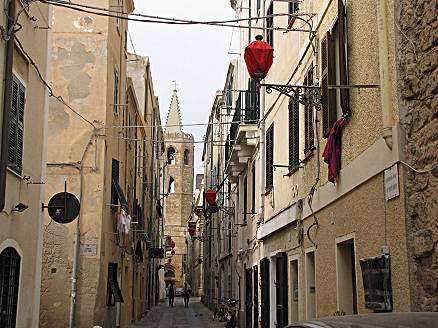 Sardinia - lines washing lines across the street.