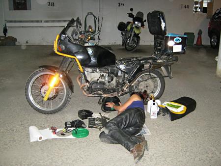 Tiffany working on bike.