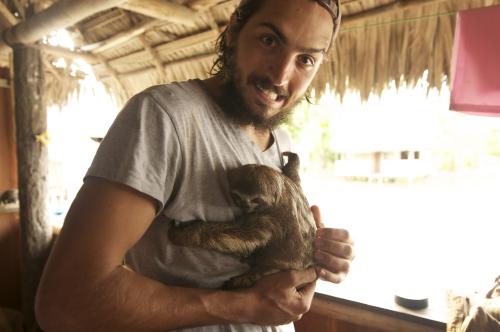 Roberto and friendly sloth.