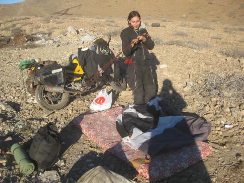 Michelle packing up campsite in Chile.