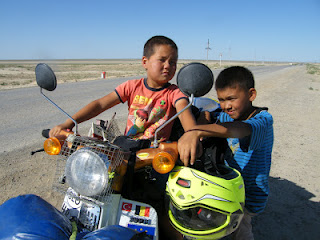 kids on bike, Kazakhstan.