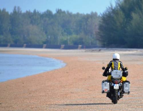 Riding on a beach in southern Thailand.