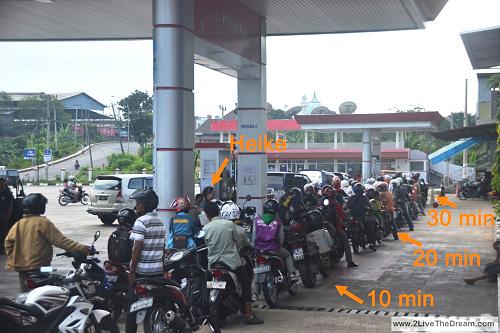 Queue at filling station, Sumatra.