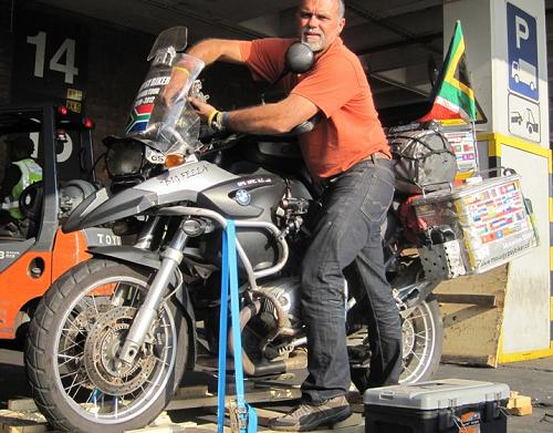 Ronnie Borrageiro, reassembling the bike in South Africa.