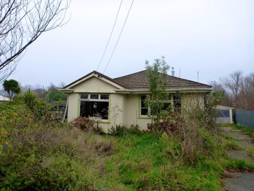Broken house, Christchurch, New Zealand.