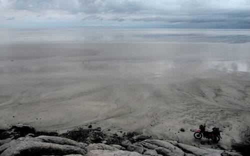 Bike on edge of salt pan, Botswana.
