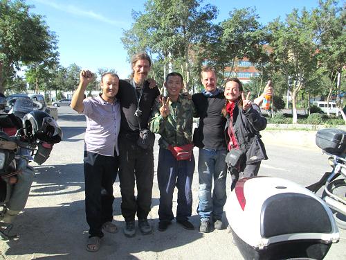 Laura Pattara posing with locals in China.