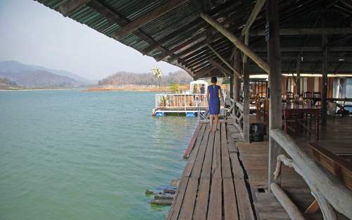 Gene and Neda finding their perfect houseboat in Thailand.
